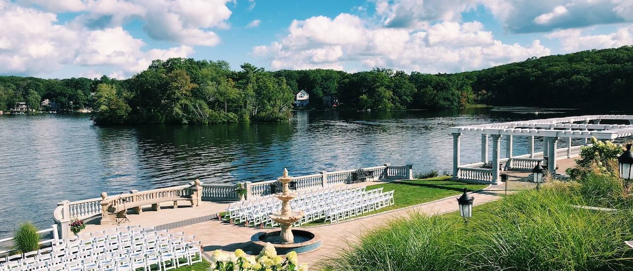 Chairs set for a lakeside ceremony at Grand View