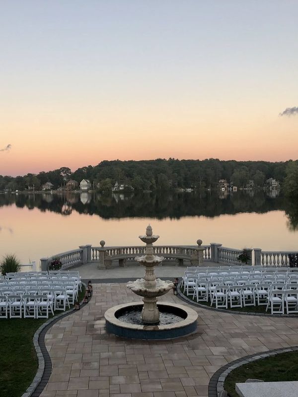 The fountain terrace at Grand View above Lake Nipmuc at sunset