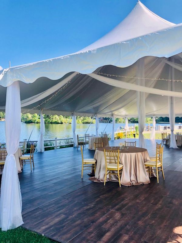 The sperry tent set for dinner at Harrington Farm
