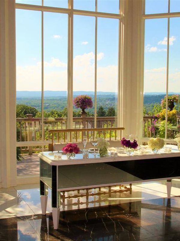 The glass-walled room at Westmount looking out over the ridge