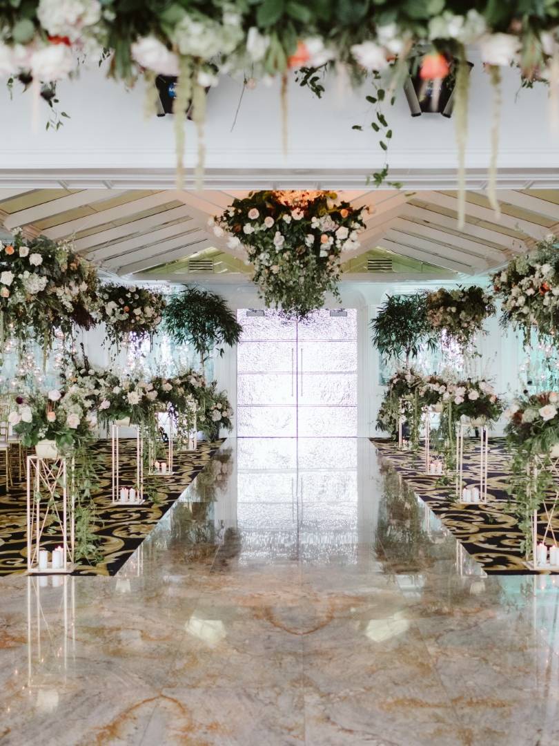 A ballroom entrance at Westmount dressed in white and blush florals